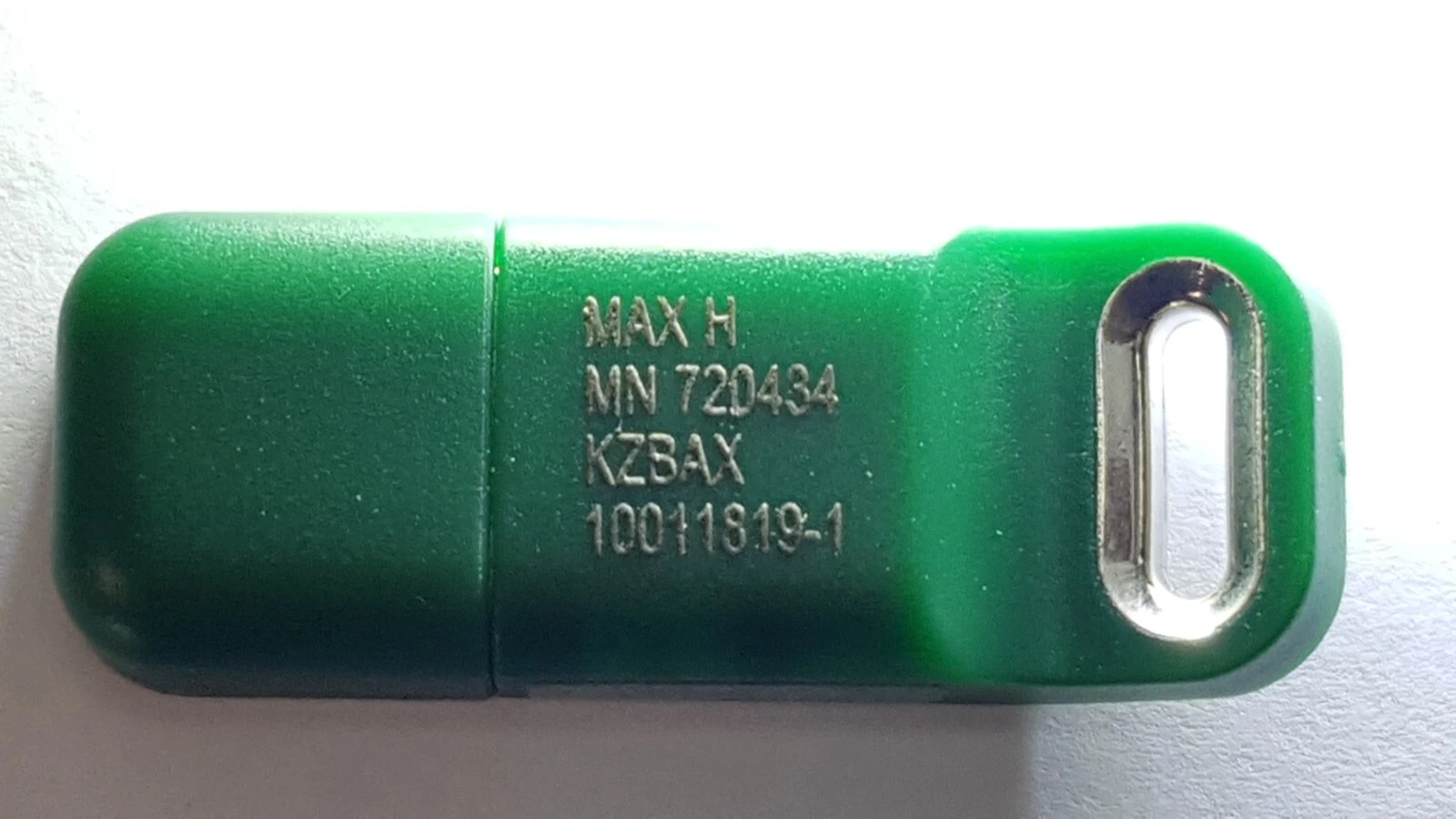 Back of the green plug, engraved MAX H, MN 720434, KZBAX, 10011819-1