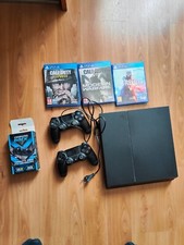 Sony PlayStation 4 500 Go 2 manettes + 5 jeux + support rechargement manette