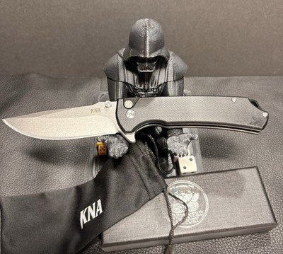 KNA Apex Black G10 Handle Drop Point Plain Edge Manual D2 Steel blade