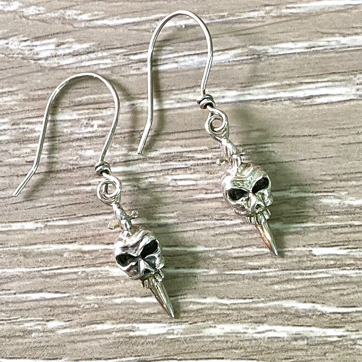 Skull dagger earrings deals