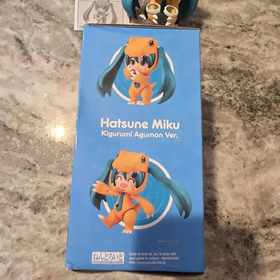 Nendoroid 1439 Hatsune Miku Digimon Hatsune Miku Kigurumi Agumon Ver. De Japón Foto 4 de 4
