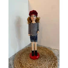 Wooden holiday nutcracker figure: schoolgirl in striped shirt, 15-in.