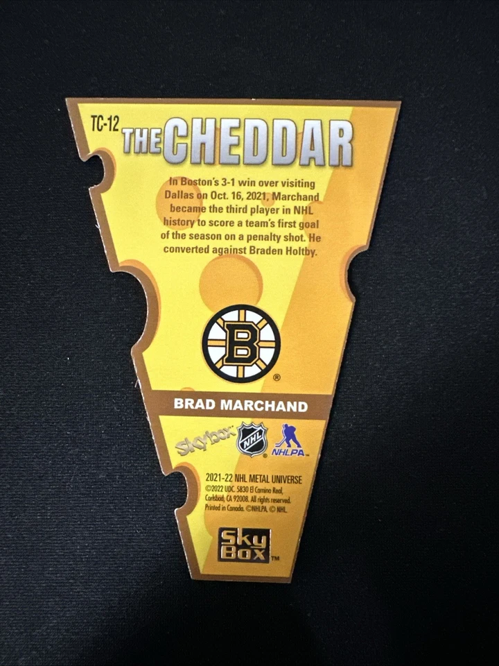 2021-22 Metal Universe The Cheddar TC-12 Brad Marchand Boston Bruins - Image 2 of 2