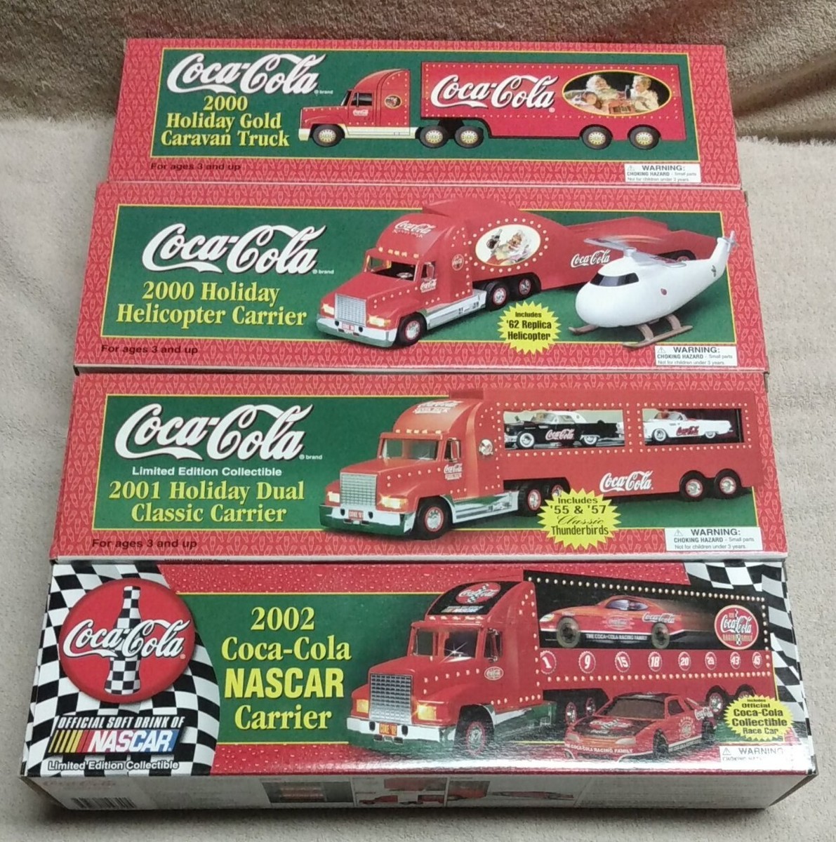 4) Limited Edition CocaCola Tractor Trailers with Light and Sound