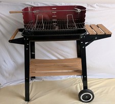 Holzkohlegrill mit Drehspieß Florabest, sauber und mobil