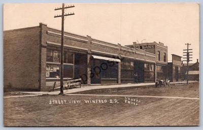 K42/ Winfred South Dakota Postcard RPPC c1910 Main Street Stores 507