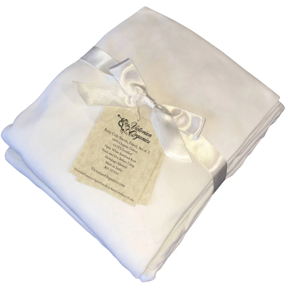 Juego de 2 sábanas ajustables para cuna de algodón orgánico suave ropa de cama para bebé blanco liso Foto 2 de 4