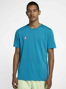 turquoise and black nike shirt