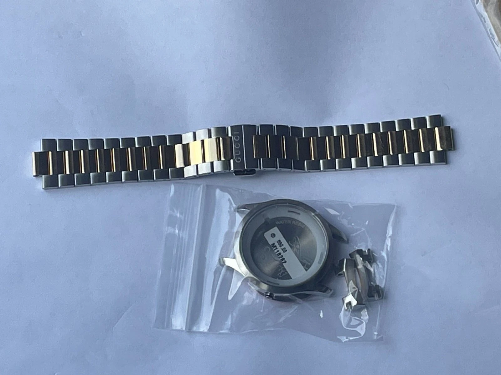 (LOT A474) Bracelet et boîtier de montre GUCCI St acier et plaqué or neuf Réf 126.4