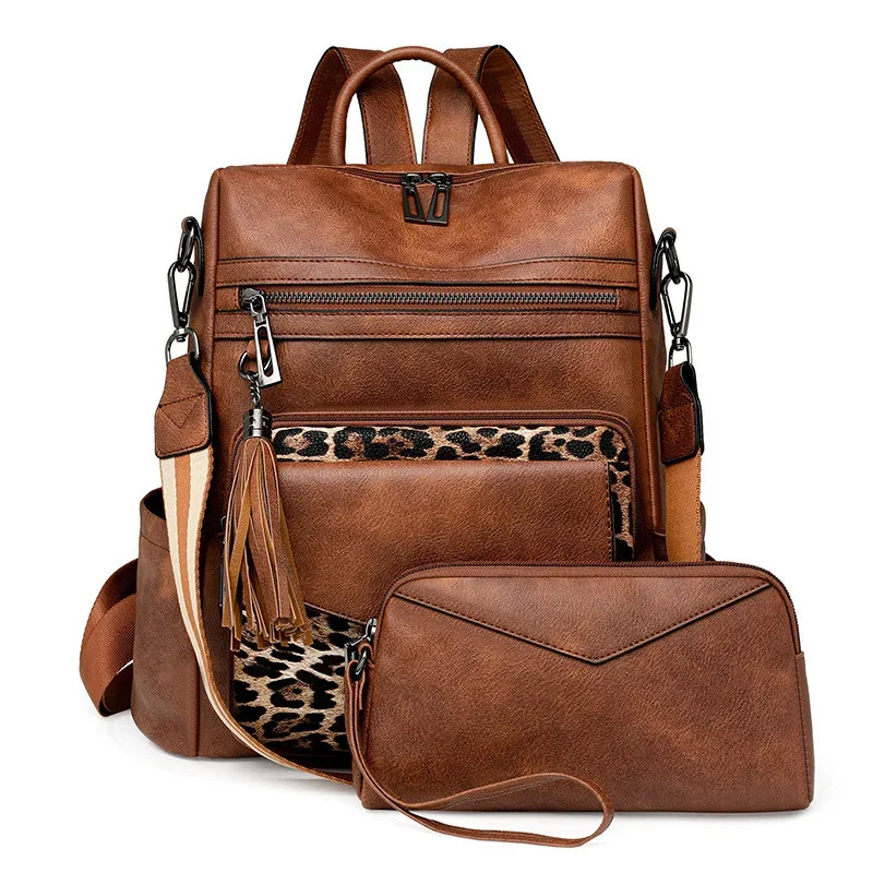 Mochila de viaje retro antirrobo impermeable de cuero PU para mujer borla