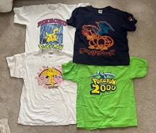 Lote De 4 Camisas Pokémon De Colección Charizard Lugia Pikachu Clefairy Jigglypuff
