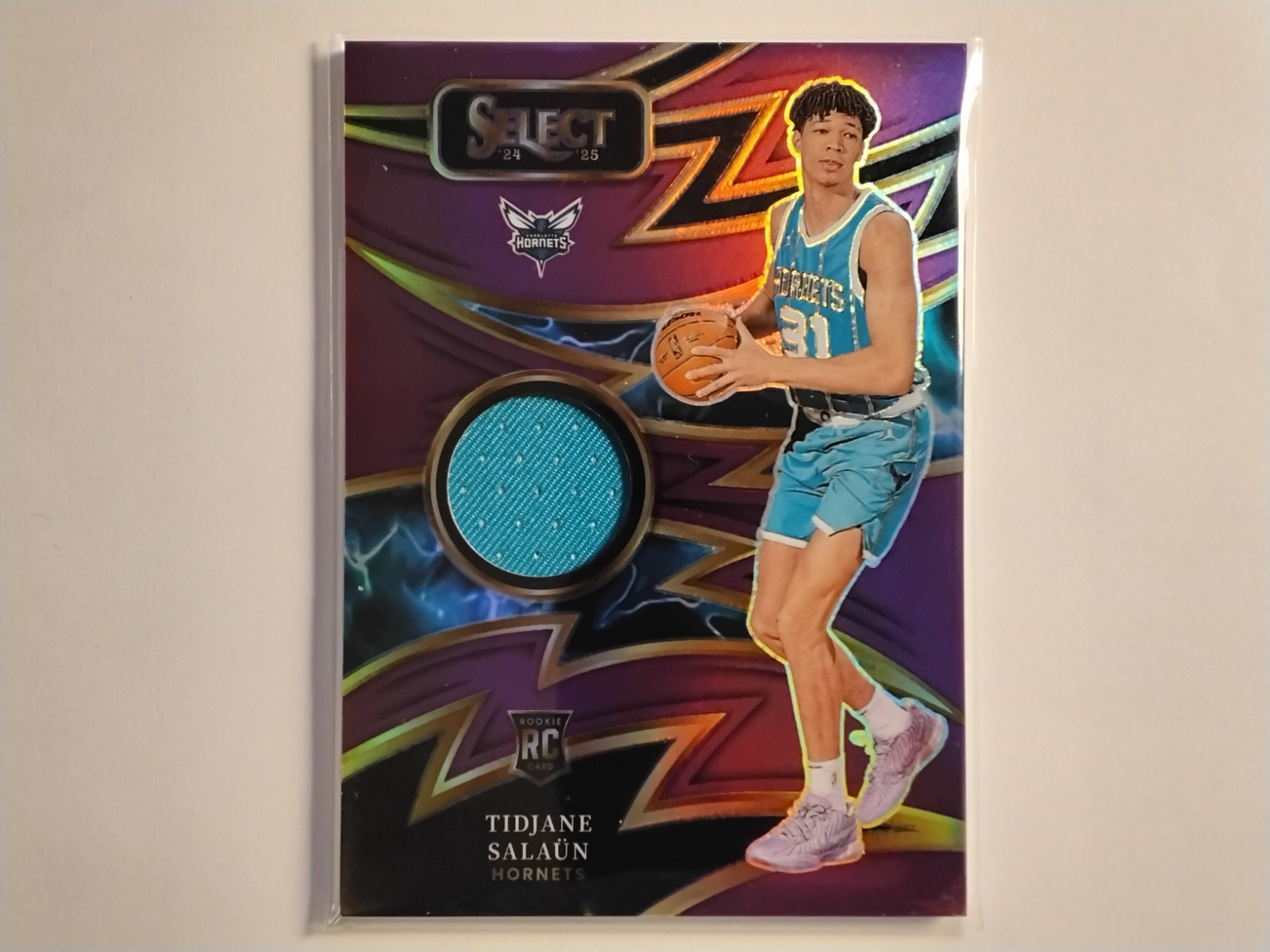 2024-25 Panini Select Sparks (MEM) Tidjane Salaün #SPK-TID Purple Prizm /99 (RC)