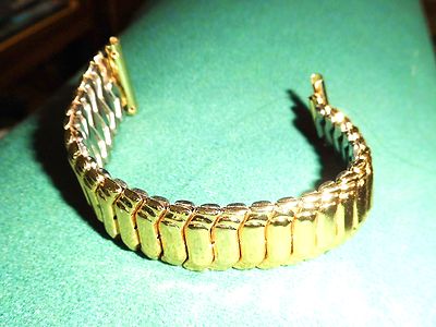 Breites Uhrenarmband ''Eloxal'',dehnbar,vergoldet