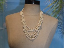 Necklace with a Multi Strands of White Beads 20"