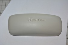 Calvin Klein Eyeglass/sun case Solid white with Black cloth. New and Perfect 
