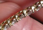 14K stamped tennis bracelet with white stones.  — photo 5