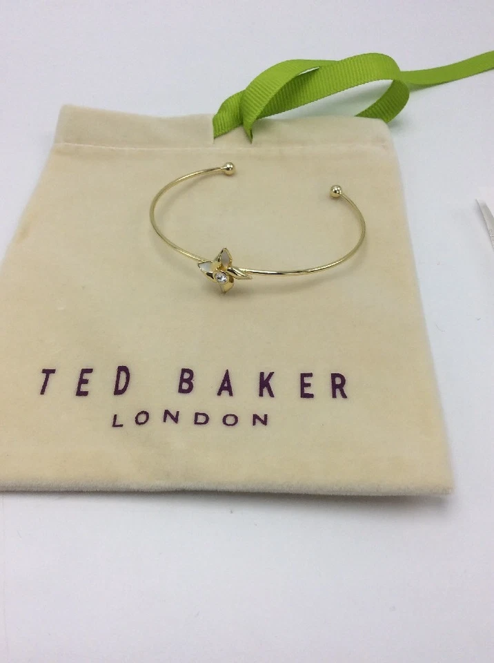 Colgante Ted Baker Brisa Cristal Esmalte Blanco Tono Dorado $45 Foto 2 de 4