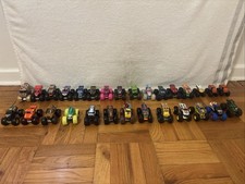 Monster Jam 1:64 Lot Of 29 Monster Trucks Mixed Hot Wheels Mattel