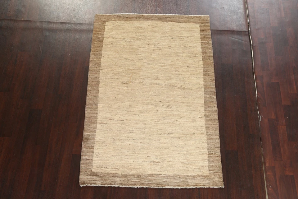 Alfombra oriental Gabbeh Kashkoli con bordes de lana anudada a mano alfombra marfil 5'x7' Foto 2 de 4