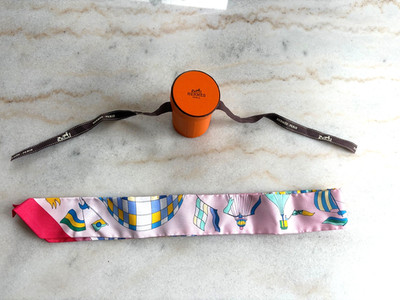 Hermes Scarf - a luxurious high-quality silk made with a vibrant pink pattern