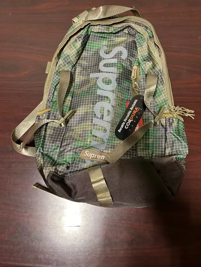 Sac à dos camouflage bois réfléchissant 3M Supreme résistant à l'eau SS24 logo en relief