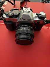 Canon AE-1 Program SLR Film Camera Silver with Two Lenses