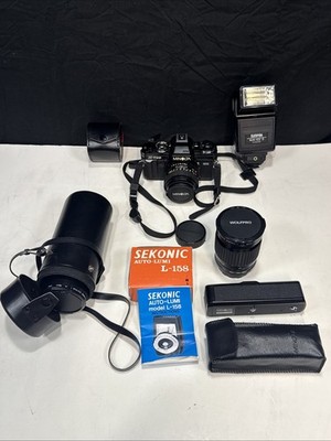Minolta X-700 35mm SLR Film Camera with 50 mm 1:2 W/ More Lenses & Accessories