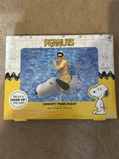 NEW, PEANUTS SNOOPY RIDE-ON POOL FLOAT, 53" X 18" X 25"