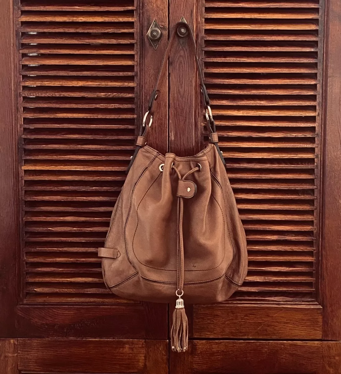 Danier Brown Leather Hobo Bag with Tasseled Drawstring Closure eBay