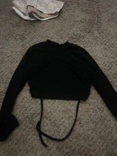 backless black long sleeve cropped
