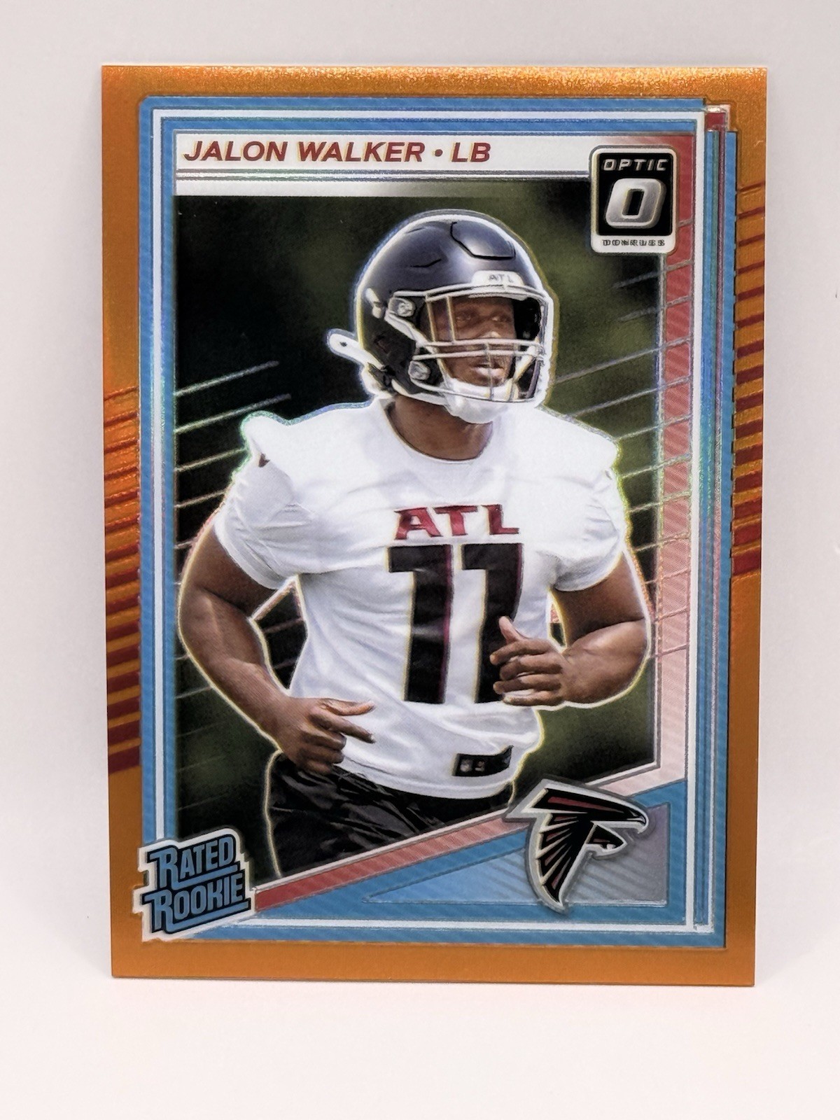 2025 Donruss Optic Rated Rookies #290 Jalon Walker Orange /299 Falcons