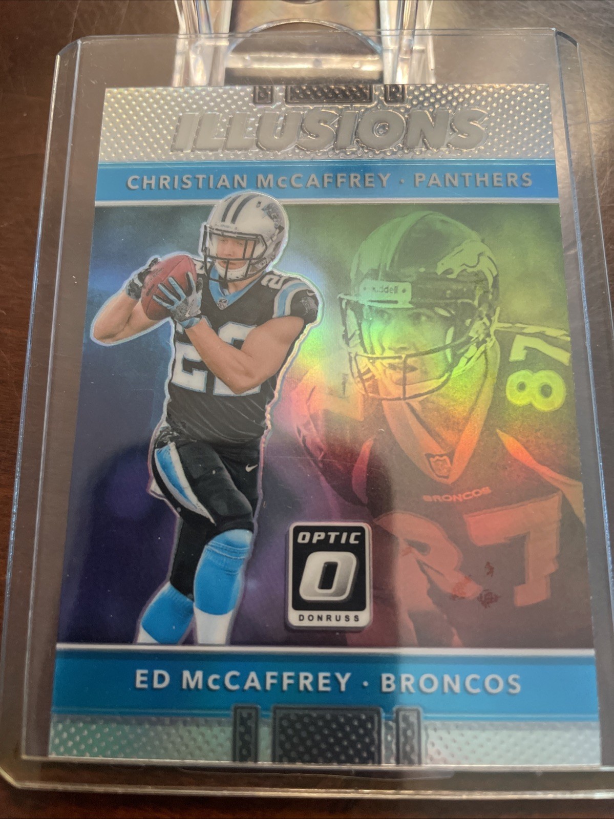 2017 Donruss Optic - Illusions Christian McCaffrey, Ed McCaffrey #18 Holo Silver