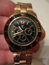 LADIES' ROSE GOLD TONE WATCH WITH BLACK FACE AND BLACK BEZEL - QUARTZ - BBA-13