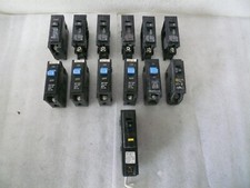 Lot of 13 Pieces of Assorted 15 Amp Single Pole Circuit Breakers