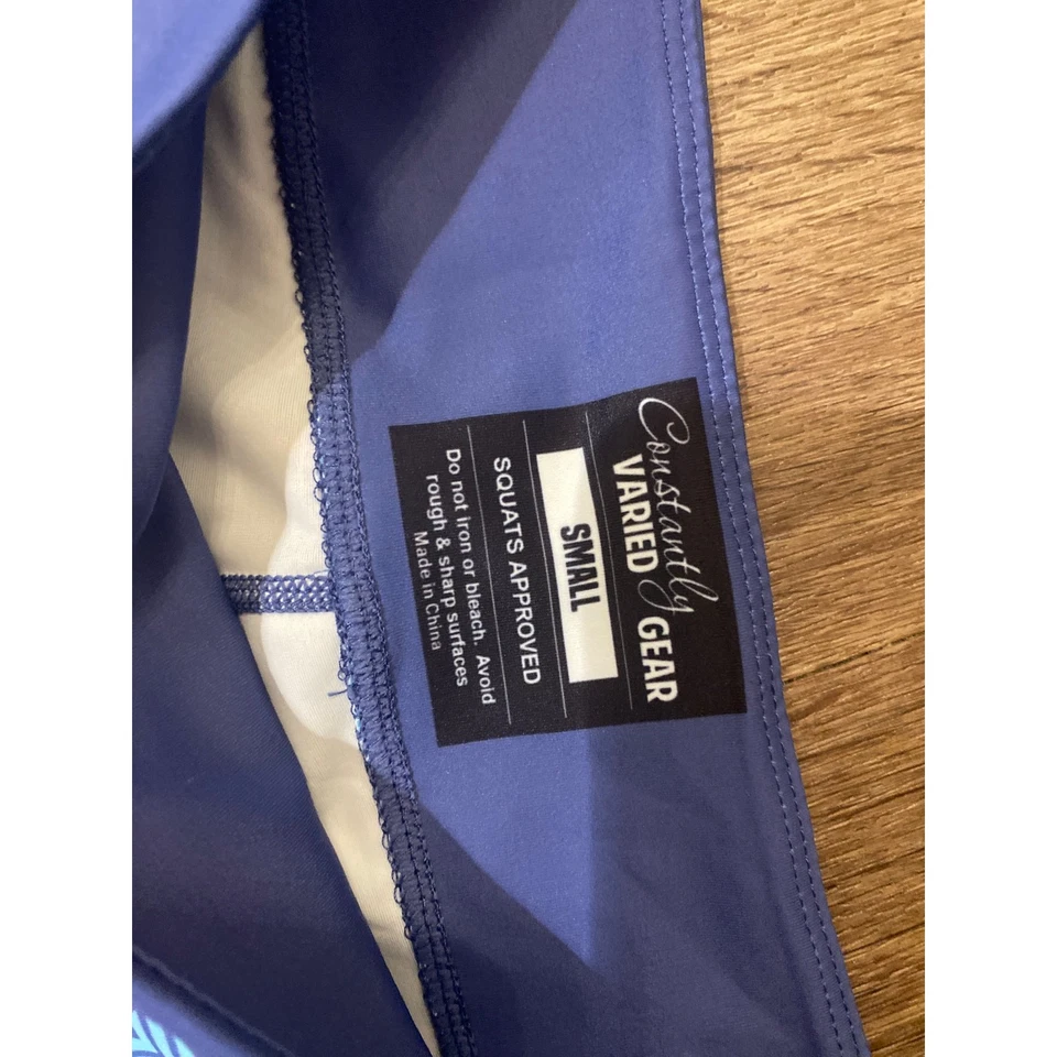 Calzas Geométricas Estrella Cómic Naranja Negro Sentadilla Equipo Constantemente Variado CVG TALLA S Foto 3 de 4