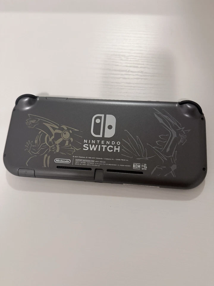 Nintendo Switch Lite Dialga y Palkia Edición Limitada con Caja Foto 2 de 4