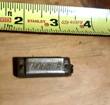 Hohner miniature harmonica vintage and a bit rusty