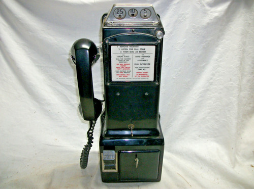 Old non-dial Western Electric type Northern Electric 3-slot payphone