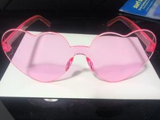 Pink Heart Shaped Sunglasses Made Out Of Plastic Light Scratches
