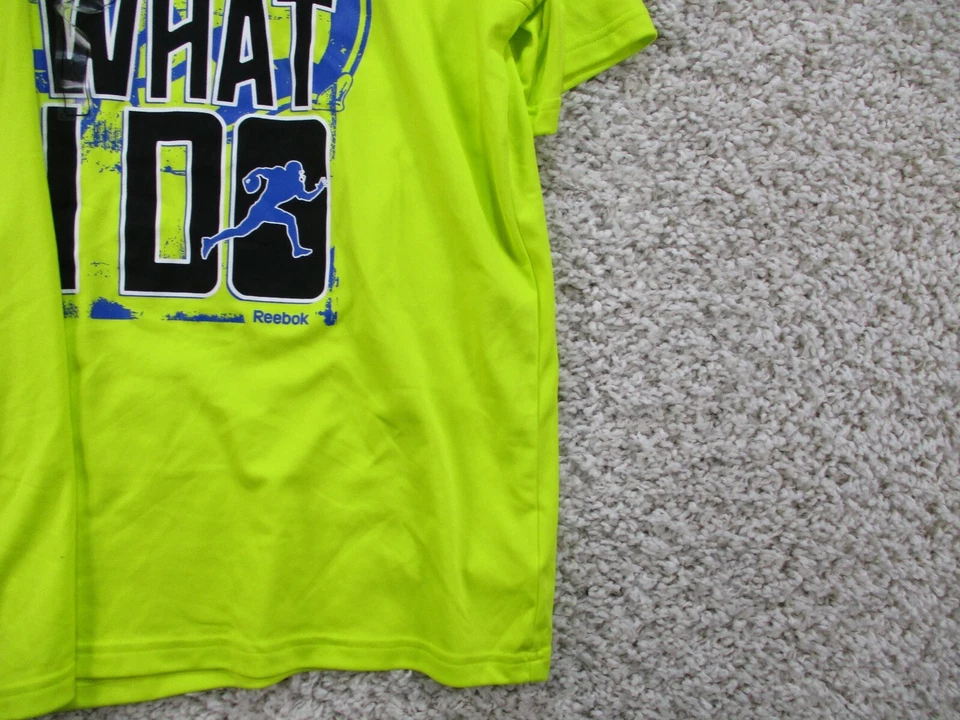 Camisa Reebok Niños Grande Amarilla Manga Corta Cuello Redondo Atlética Poliéster Camiseta Foto 4 de 4