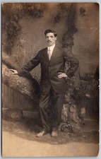 Postcard RPPC Well Dressed Man Posing Studio Photo R05