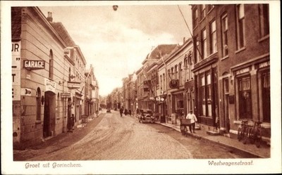 Ak Gorinchem Südholland, Westwagenstraat, Straßenpartie, Garage, Cafe - 3713157