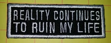 REALITY CONTINUES TO RUIN MY LIFE MOTORCYCLE BIKER EMBROIDERED VEST PATCH 