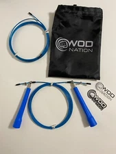 NEW, BLUE, WOD NATION  SPEED JUMP ROPE. ADJUSTABLE WITH EXTRA CABLE & CARRY BAG.