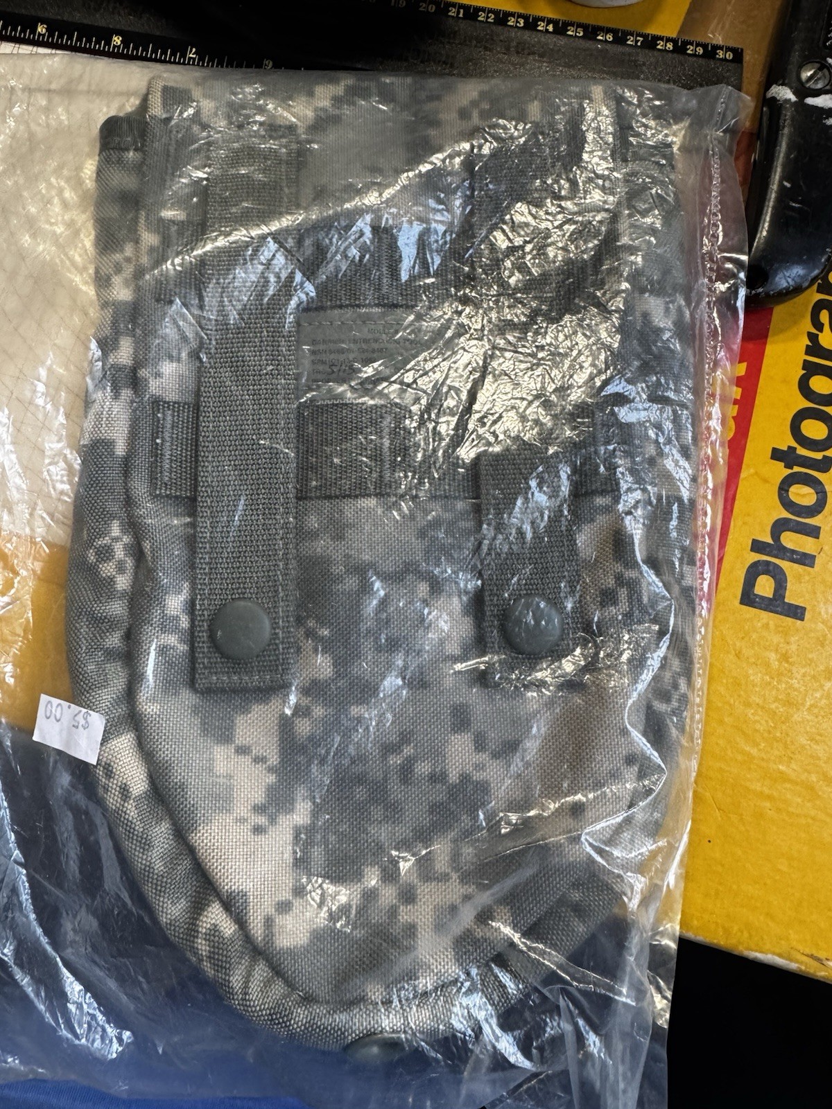 Camouflage trenching tool cover with straps factory sealed