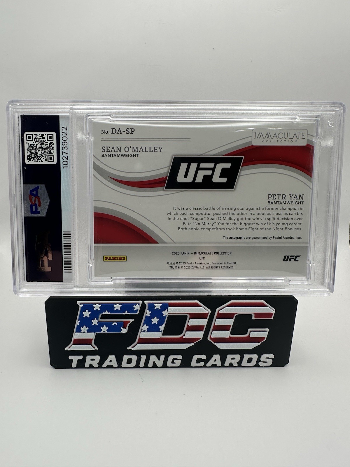 2023 Panini Immaculate UFC Sean O’Malley & Petr Yan Dual Auto /25 PSA 9 view 2