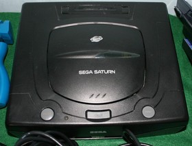 Sega Saturn Bundle: Console, controllers, light guns, House of the Dead + more