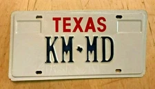 TXS VANITY AUTO LICENSE PLATE " KM MD " TX  KEN MURPHY DR KIM MILLER KARL MARTIN