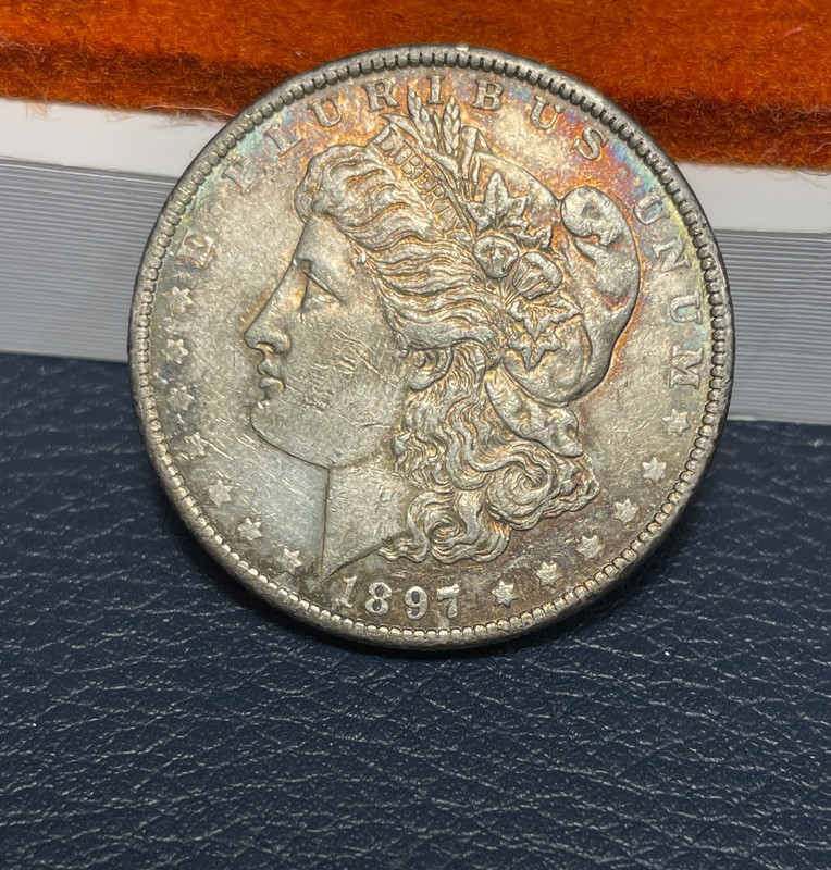(#100673) Morgan Dollar: 1897 O  AU+. Great toning. better date!    (see video!)