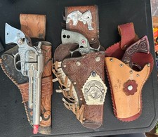 HUBLEY TEXAN JR CAP GUN and 2 other toy guns with leather holsters